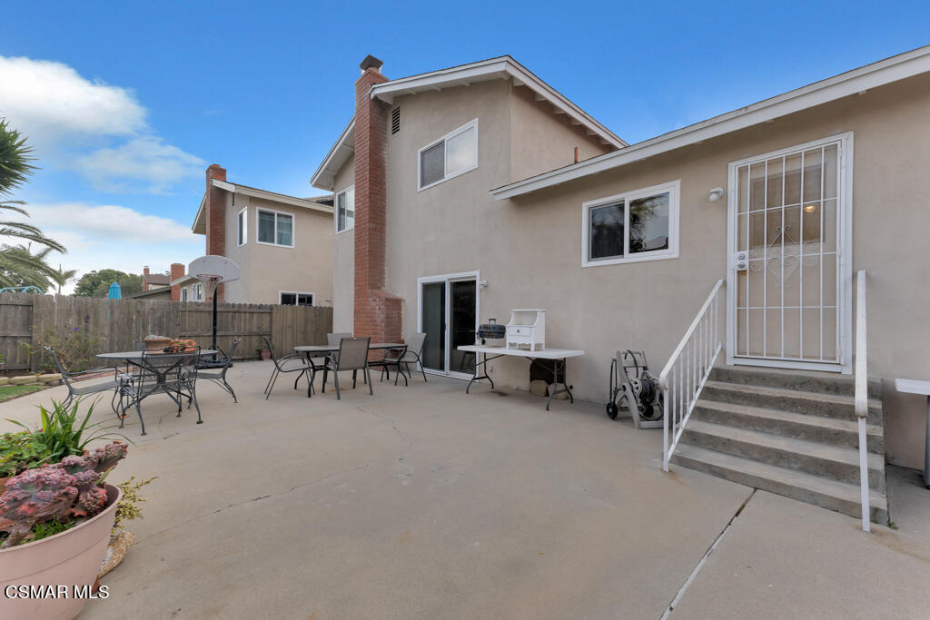 1300 Rachel Drive Oxnard, CA 93030 - Photo 37 of 50 a view of a house with patio and a garden