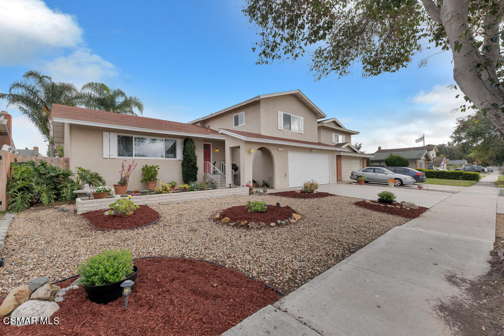 1300 Rachel Drive Oxnard, CA 93030 - Photo 42 of 50 a front view of a house with garden
