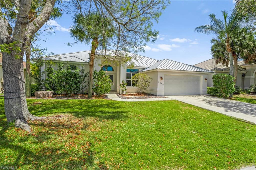 2640 White Cedar Lane Naples, FL 34109 - Photo 1 of 50 totally remodeled home with 400 sq.ft living space addition in 2019