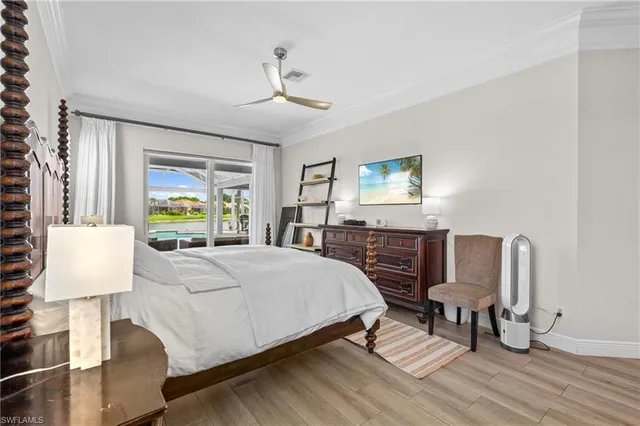 a bed room with a bed and a window