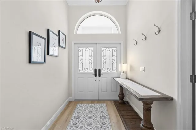 a bathroom with a sink a mirror and vanity