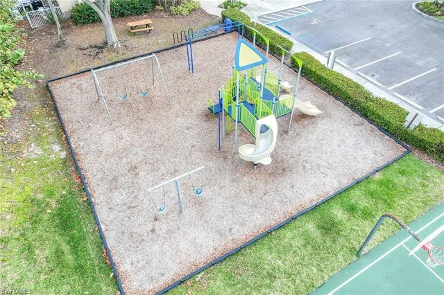a view of a backyard with sitting area