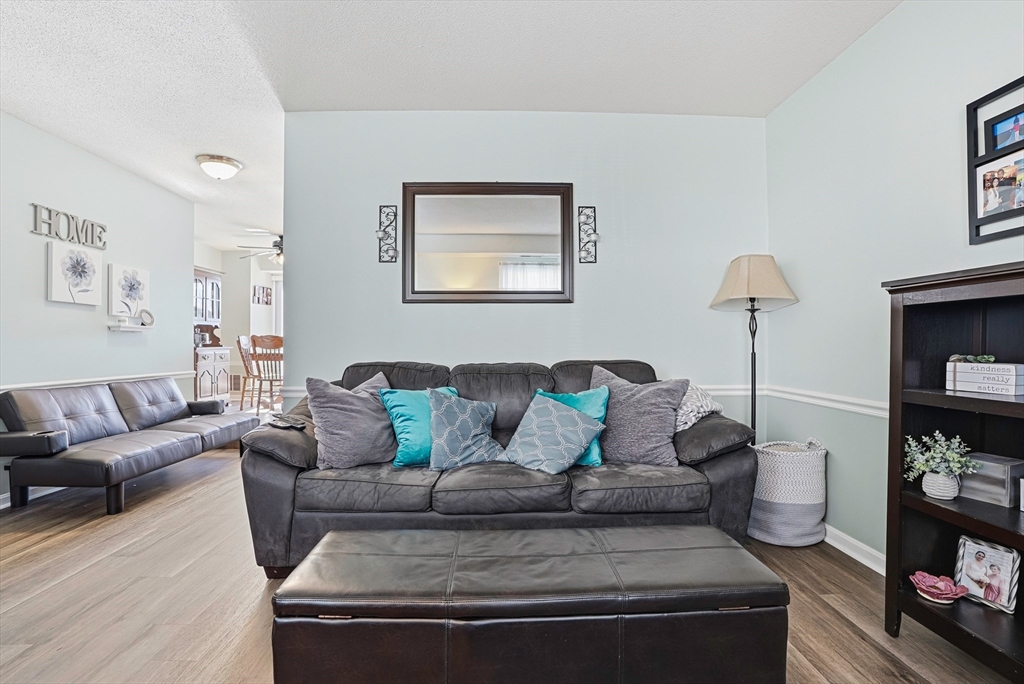 96 Century Way, Unit 96 Gardner, MA 01440 - Photo 15 of 41 a living room with furniture and a couch