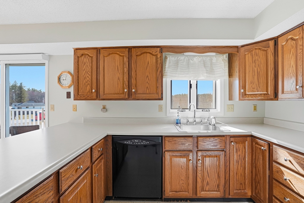 96 Century Way, Unit 96 Gardner, MA 01440 - Photo 20 of 41 a kitchen with a sink and a window