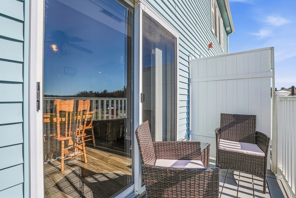 96 Century Way, Unit 96 Gardner, MA 01440 - Photo 30 of 41 a balcony view with a rug