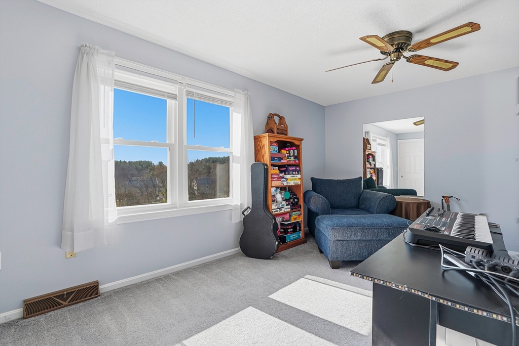96 Century Way, Unit 96 Gardner, MA 01440 - Photo 37 of 41 a living room with furniture and a window