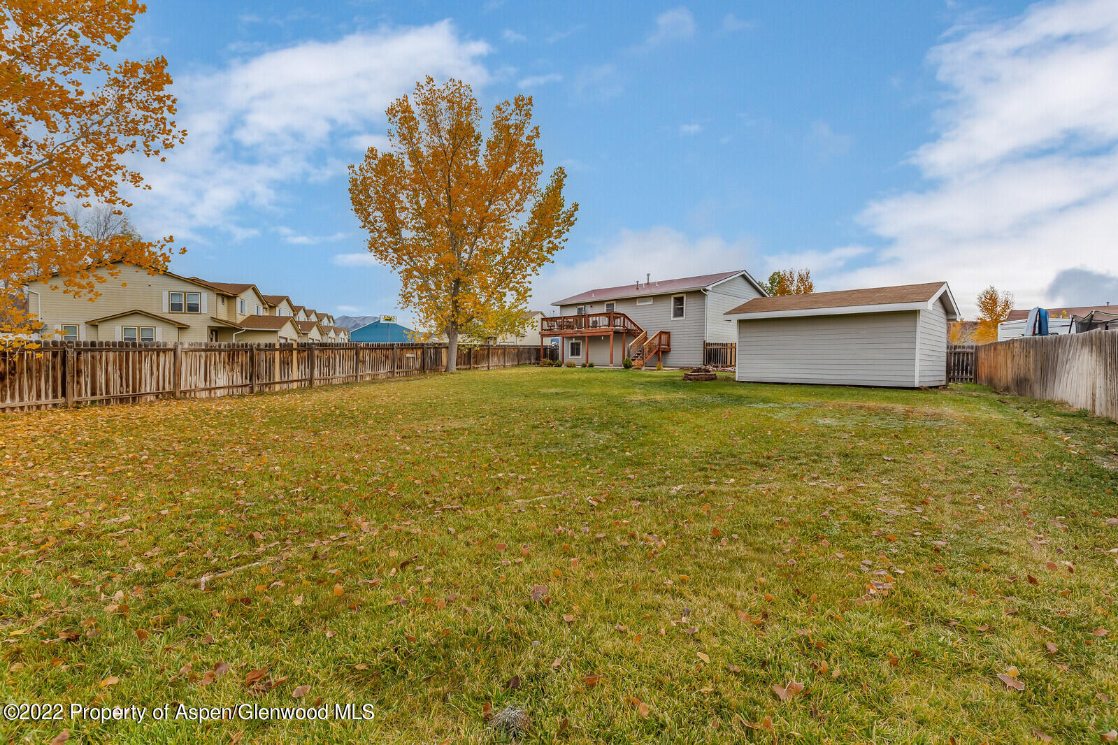 a view of a house with a big yard