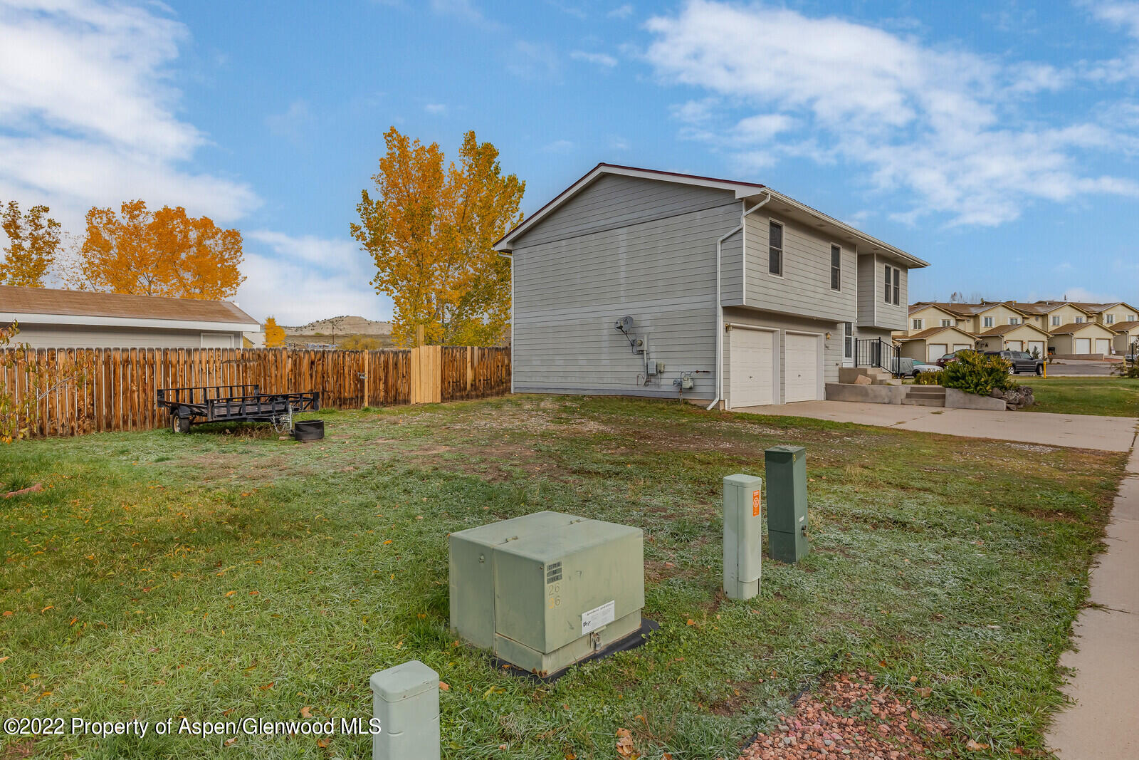 2447 Meadow Circle Rifle, CO 81650 - Photo 33 of 36 a house view with a garden space