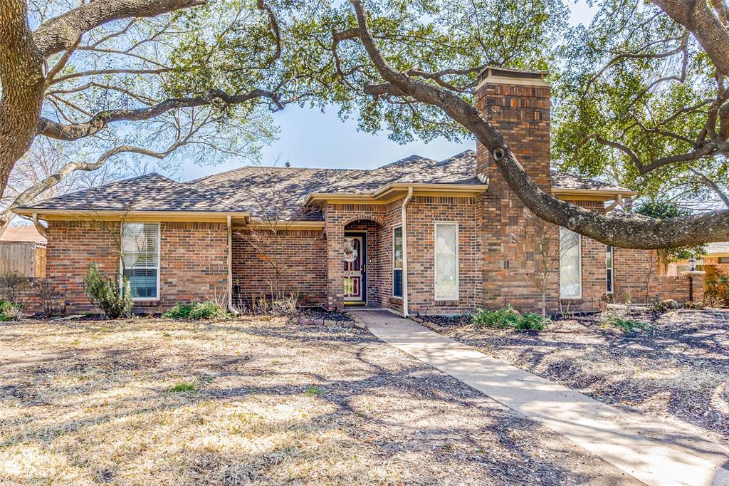 124 Toler Drive Mesquite, TX 75149 - Photo 1 of 1 a view of a house with a tree and a yard