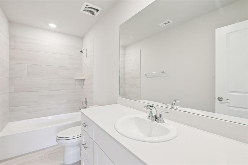 1637 Arches Road Anna, TX 75409 - Photo 23 of 28 Photo is not of the actual home, but is an inspirational photo of builder’s model home and may depict options, furnishings, and/or decorator features that are not included.