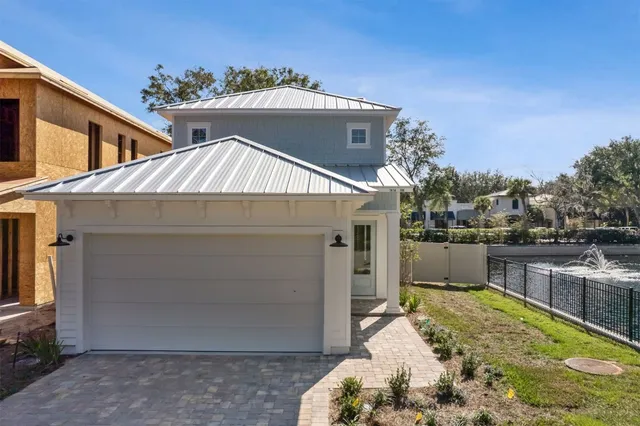 a house with trees in front of it