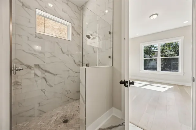 a view of an empty room with a window