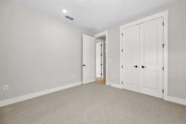 a view of a swimming pool with an outdoor space and seating area