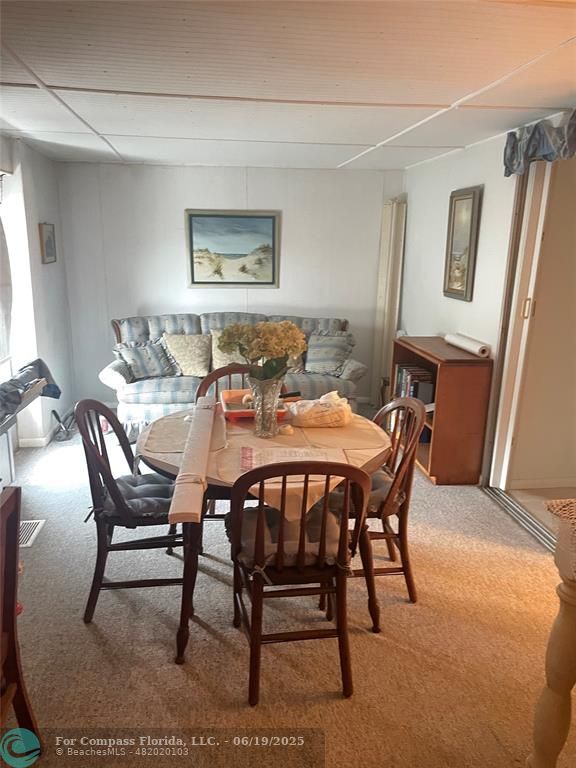 1888 Southwest 85th Avenue Davie, FL 33324 - Photo 7 of 18 a dining room with furniture and window