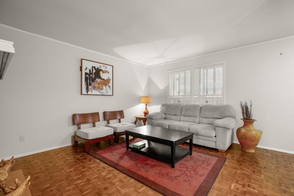 6631 Valleyside Road Austin, TX 78731 - Photo 8 of 33 a living room with furniture and a rug