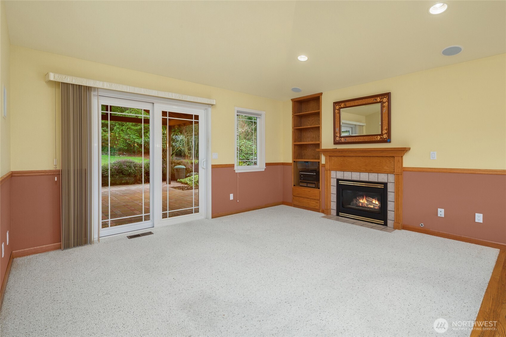 18663 Cascade Ridge Court Mount Vernon, WA 98274 - Photo 21 of 33 a living room with furniture and a fireplace