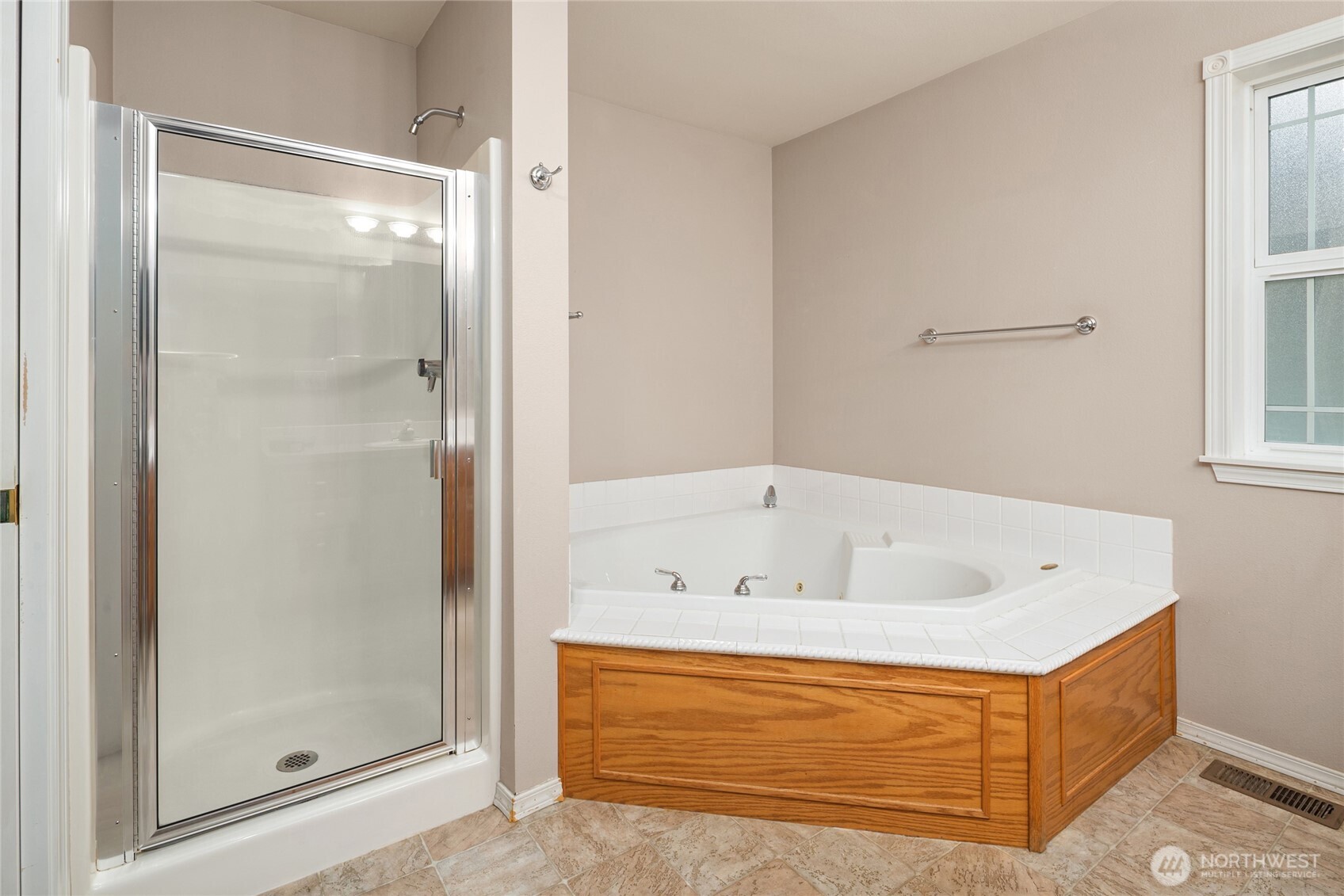 18663 Cascade Ridge Court Mount Vernon, WA 98274 - Photo 24 of 33 a bathroom with a tub and a shower