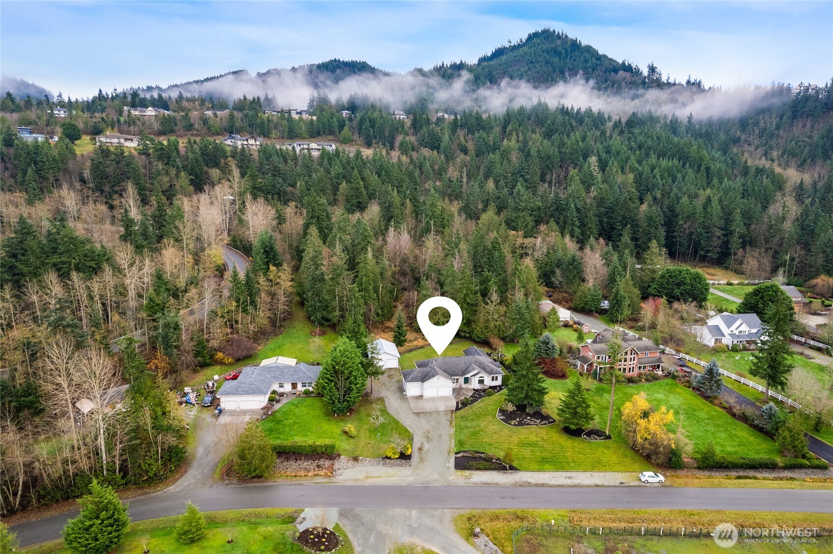 18663 Cascade Ridge Court Mount Vernon, WA 98274 - Photo 31 of 33 an aerial view of a house with a garden and yard