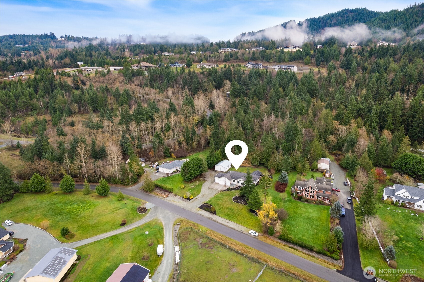 18663 Cascade Ridge Court Mount Vernon, WA 98274 - Photo 32 of 33 a view of a lake with a mountain