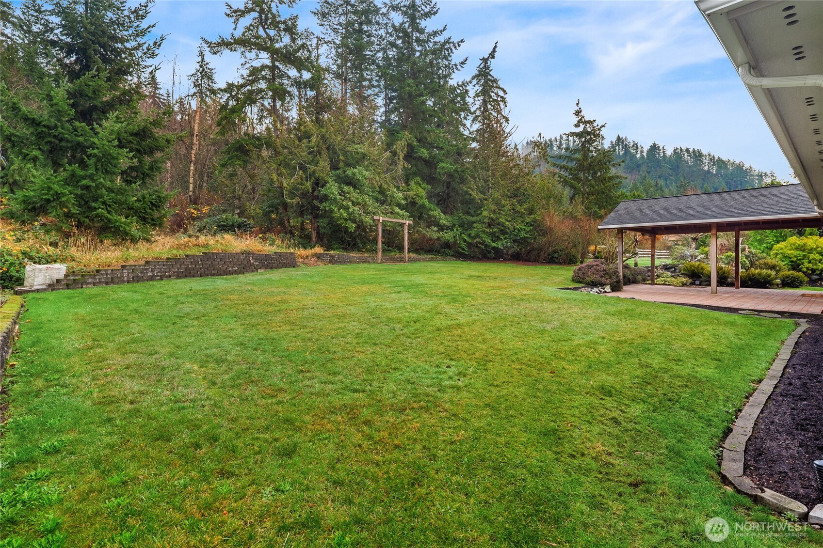 18663 Cascade Ridge Court Mount Vernon, WA 98274 - Photo 9 of 33 a view of a trees in a yard