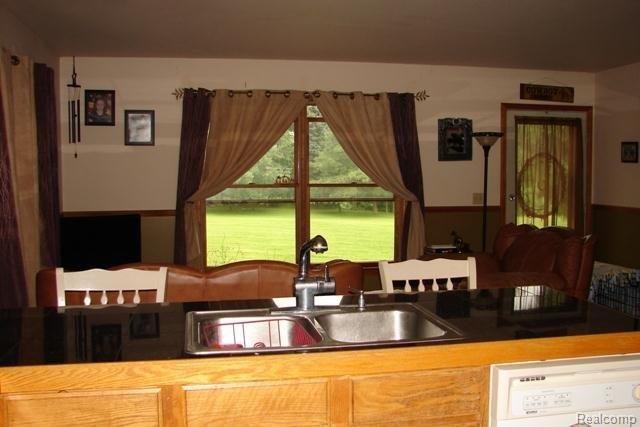 3659 Sutton Road Metamora, MI 48455 - Photo 12 of 28 Kitchen to living room.jpg