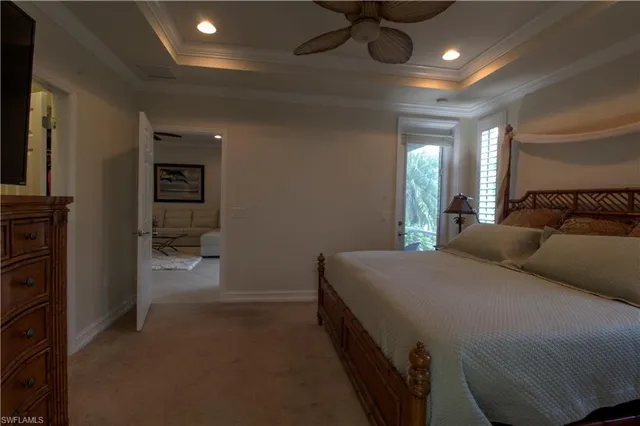 a bed room with a bed and a walk in closet