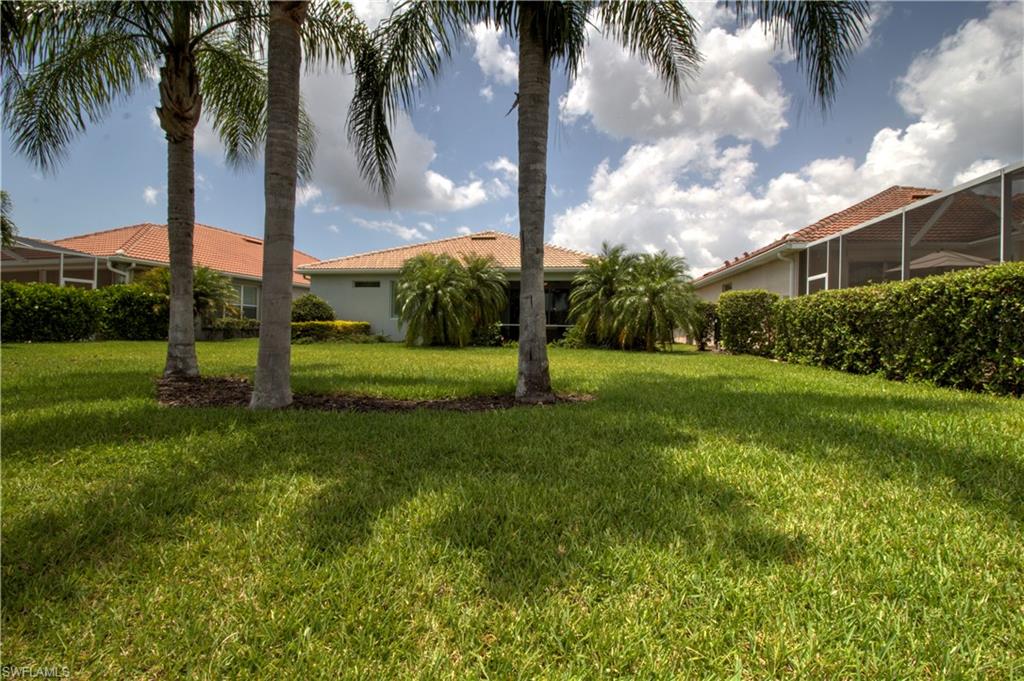 8472 Benelli Court Naples, FL 34114 - Photo 21 of 45 a view of a park with palm trees