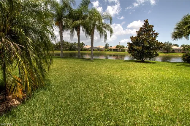 a view of a hallway with seating area