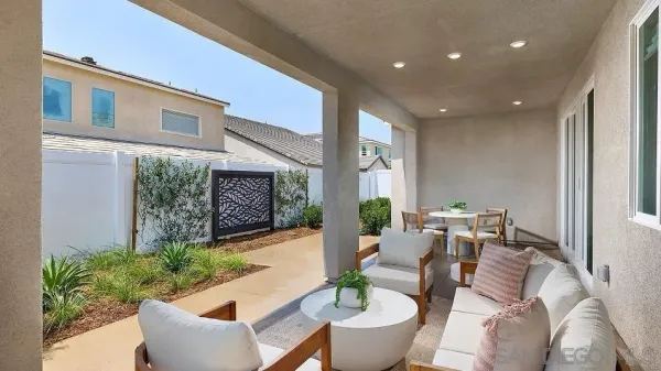 a front view of a house with patio