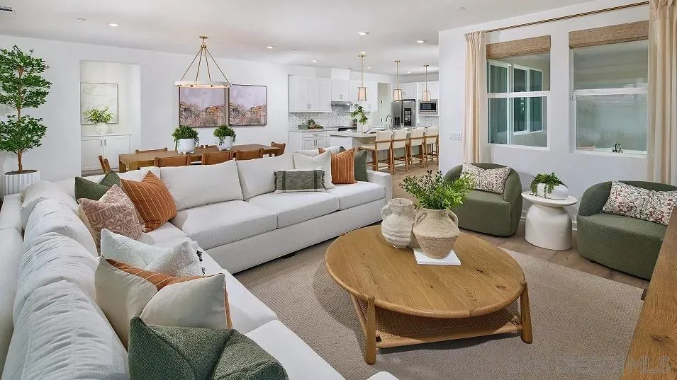 110 Takamasa Way Oceanside, CA 92057 - Photo 6 of 19 a living room with furniture and a potted plant