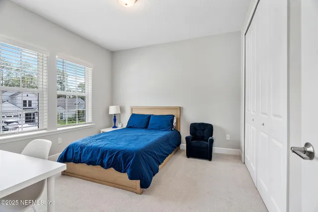 a view of a park with swings and slides