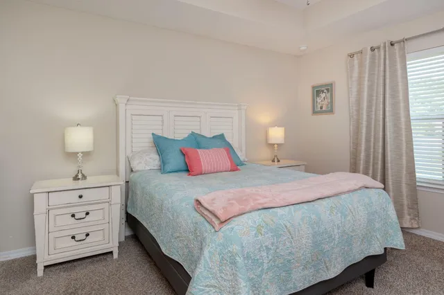 a bedroom with a bed and a closet