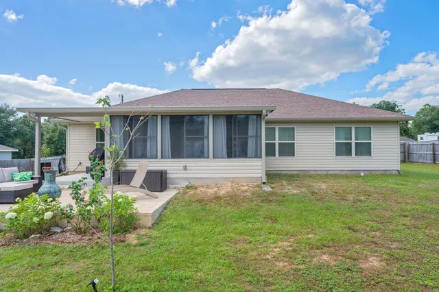 a house view with a garden space