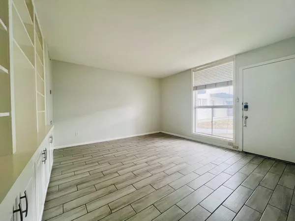 a view of an empty room and window