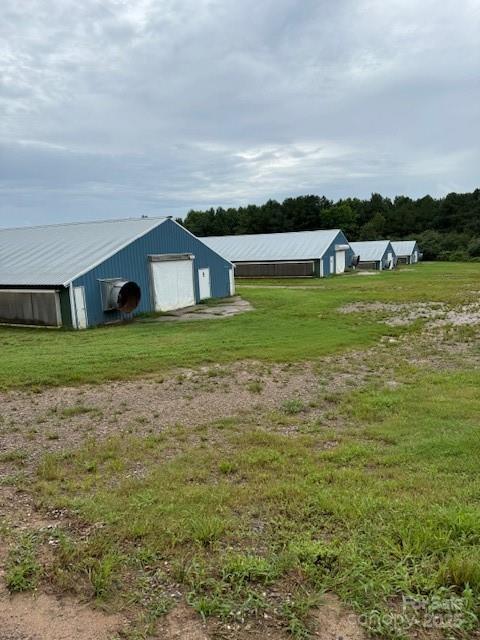 73 Rd Ellerbe Nc 28338 Road Ellerbe, NC 28338 - Photo 3 of 7 a view of a patio with a big yard