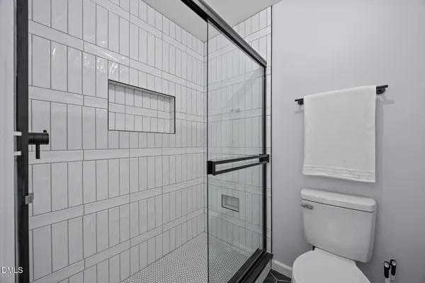 a bathroom with a sink and toilet