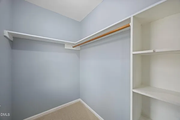 a view of a hallway with entryway