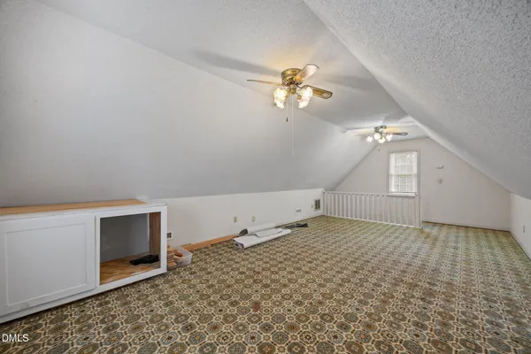 a view of a porch with a door and a window