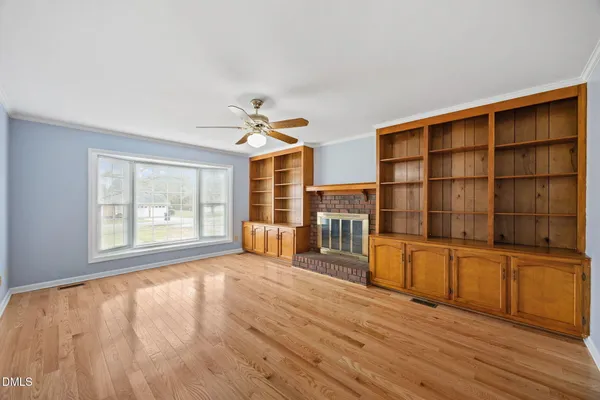 a view of a livingroom with furniture and entryway