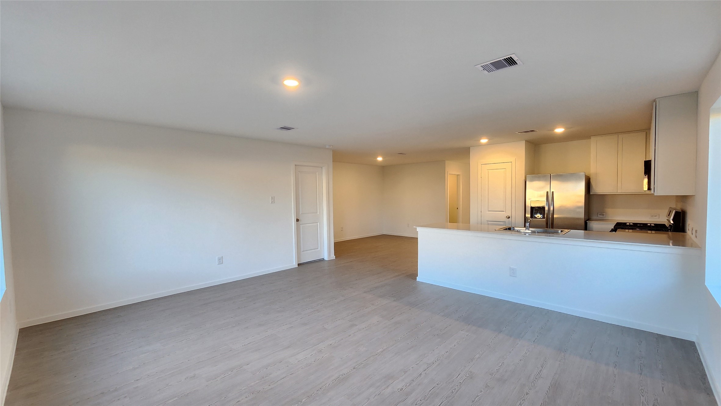 16214 Rustic Prairie Drive Hockley, TX 77447 - Photo 9 of 37 Family room to Kitchen