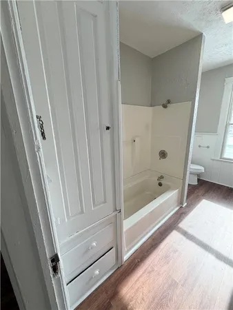 a bathroom with a bathtub