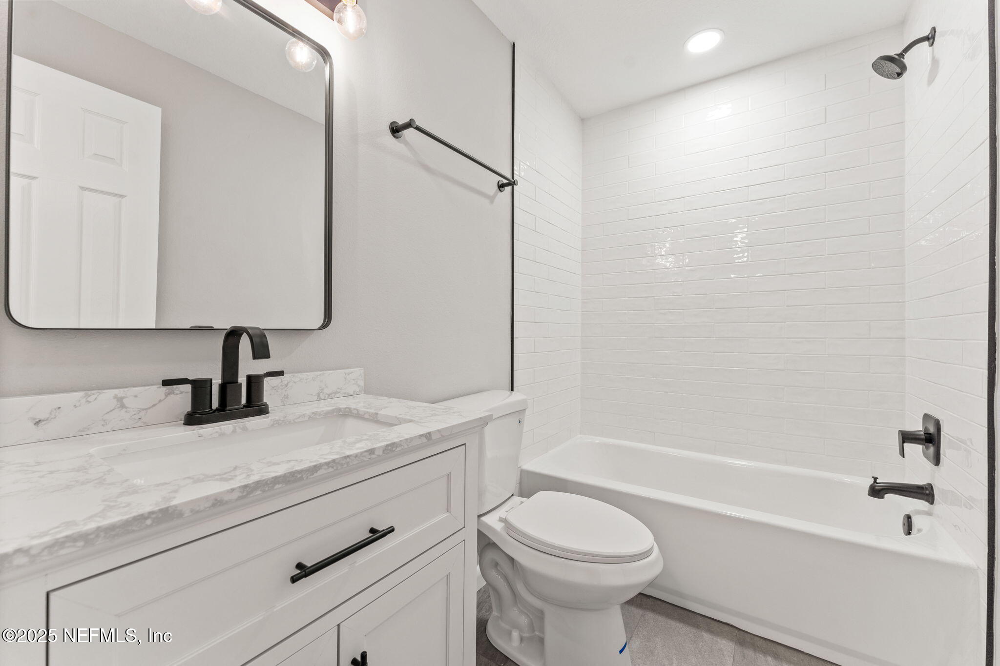 4924 Vermont Road Jacksonville, FL 32209 - Photo 11 of 19 a bathroom with a sink a toilet and a bathtub