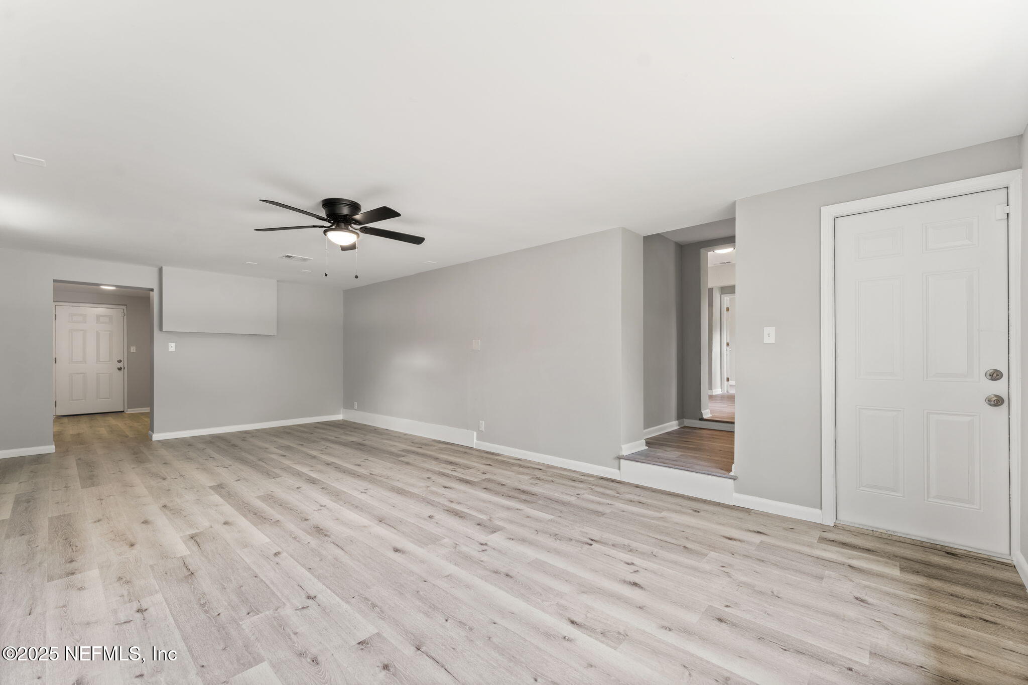 4924 Vermont Road Jacksonville, FL 32209 - Photo 6 of 19 a view of empty room with wooden floor