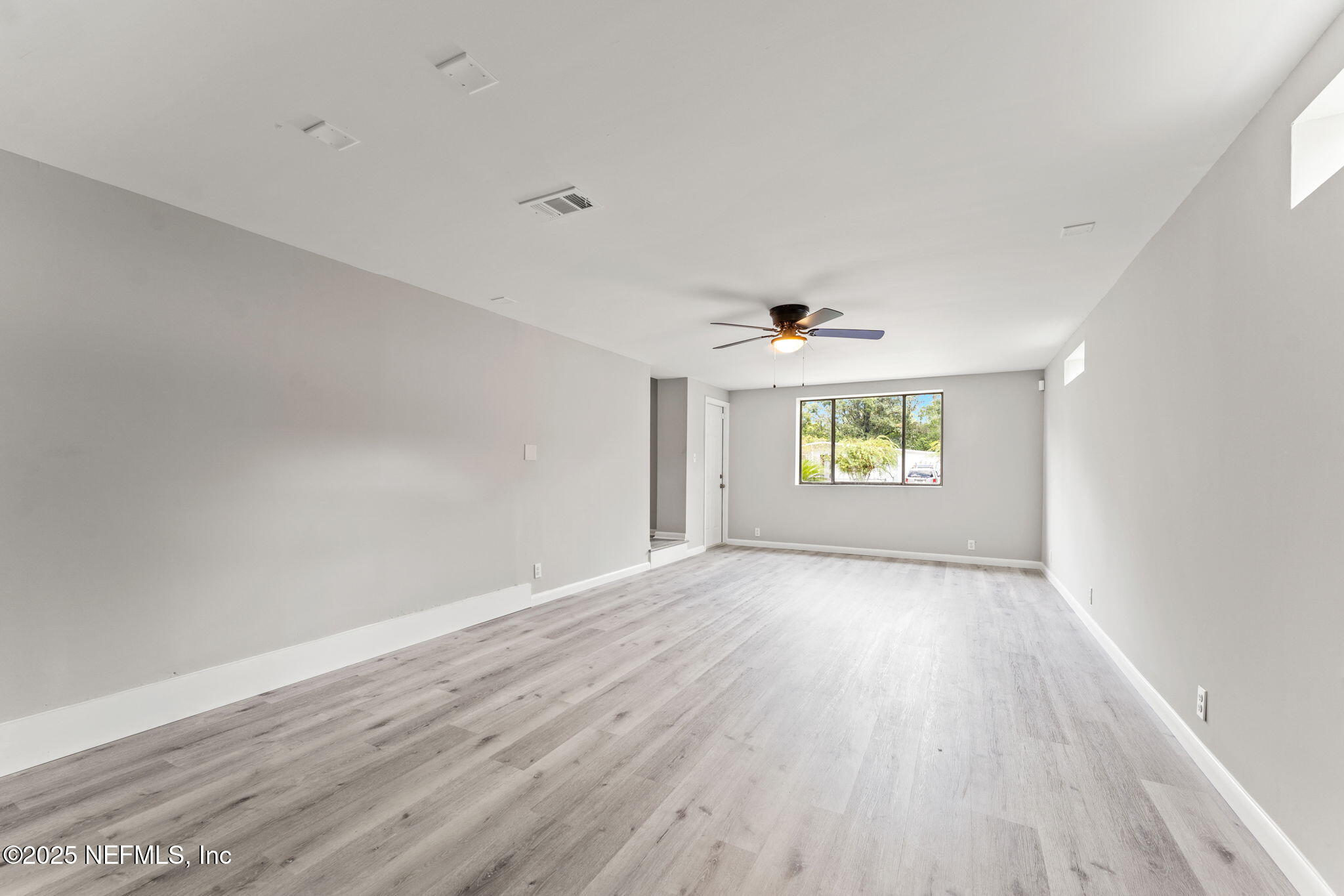 4924 Vermont Road Jacksonville, FL 32209 - Photo 7 of 19 wooden floor in an empty room