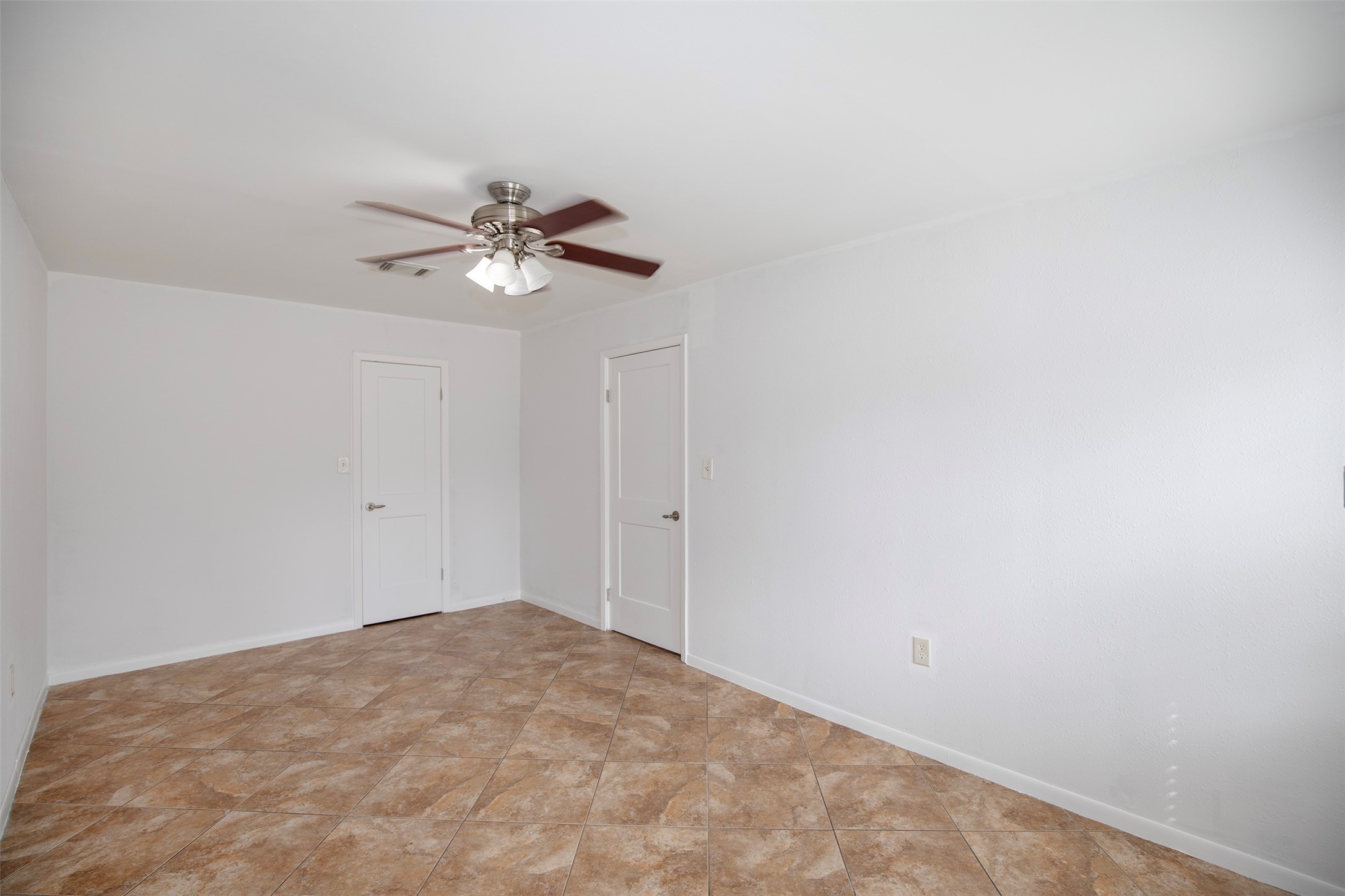 5535 Allendale Road Houston, TX 77017 - Photo 15 of 29 a view of a room with a ceiling fan and a chandelier fan