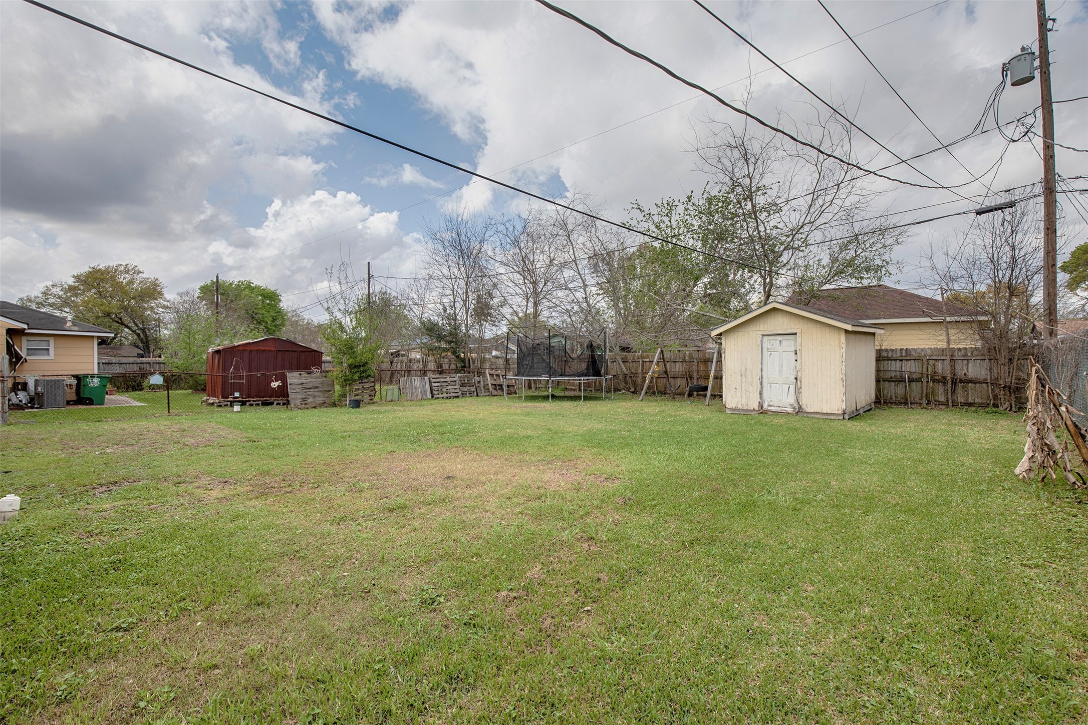 5535 Allendale Road Houston, TX 77017 - Photo 29 of 29 a yellow house sitting in middle of the grass