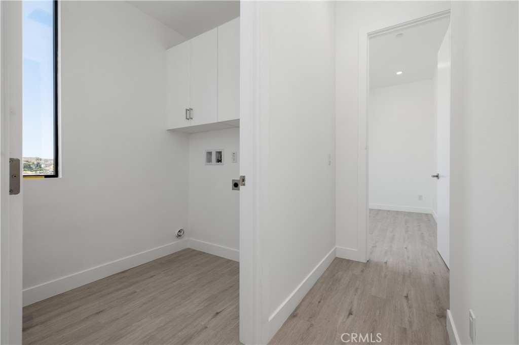 28896 Vacation Drive Canyon Lake, CA 92587 - Photo 20 of 39 an empty room with wooden floor