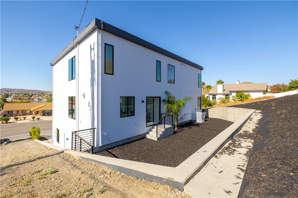 28896 Vacation Drive Canyon Lake, CA 92587 - Photo 39 of 39 a front view of house with yard