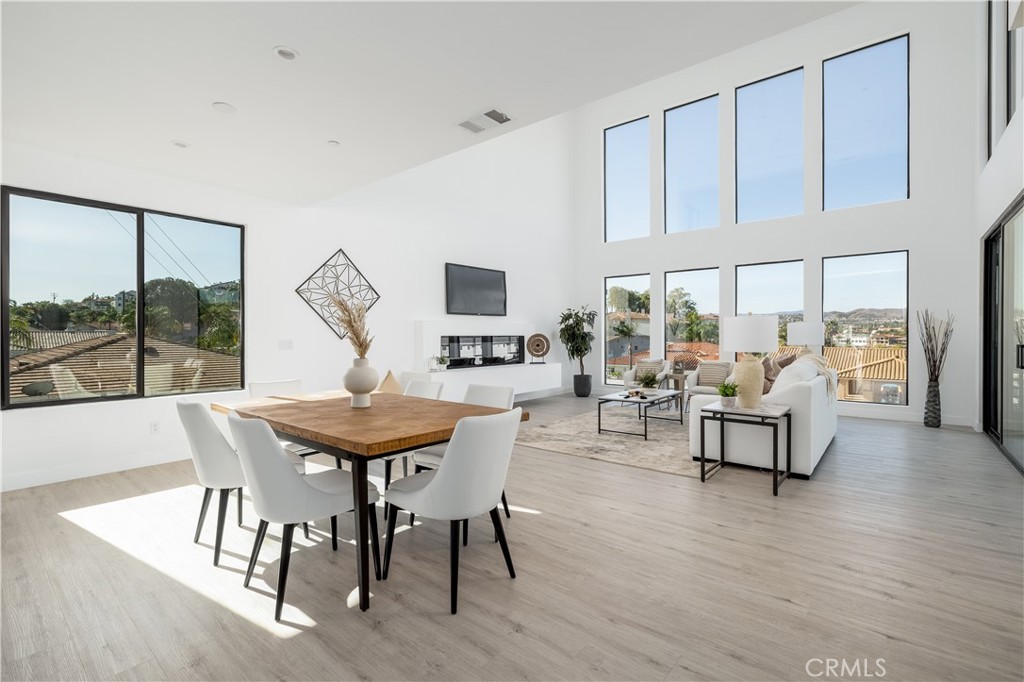 28896 Vacation Drive Canyon Lake, CA 92587 - Photo 6 of 39 a living room with furniture a table and a large window