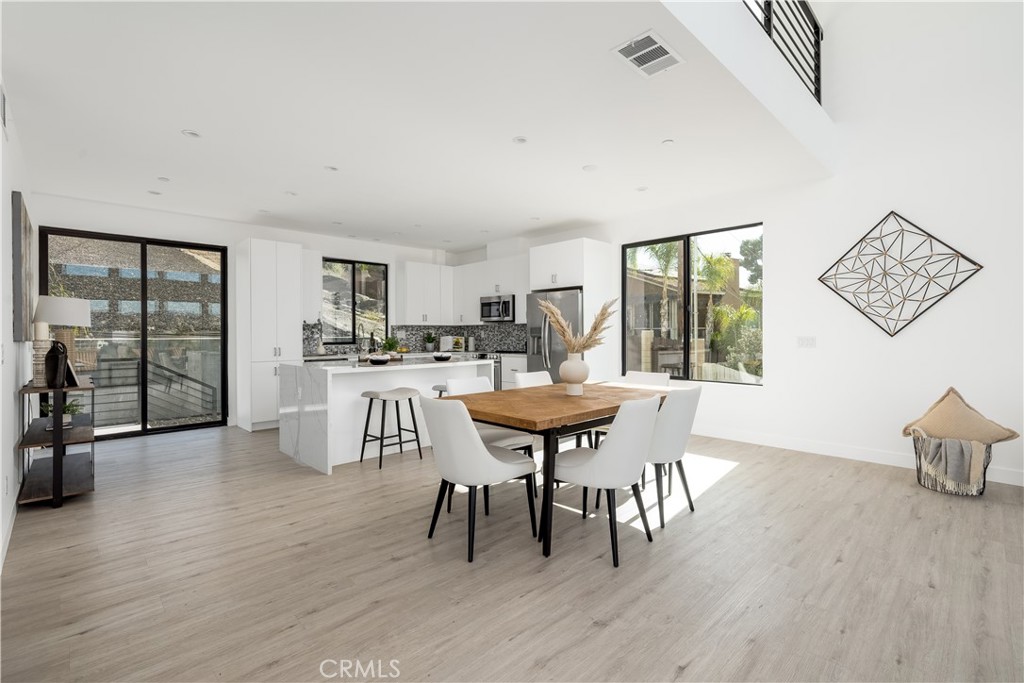 28896 Vacation Drive Canyon Lake, CA 92587 - Photo 8 of 39 a dining room with furniture and wooden floor